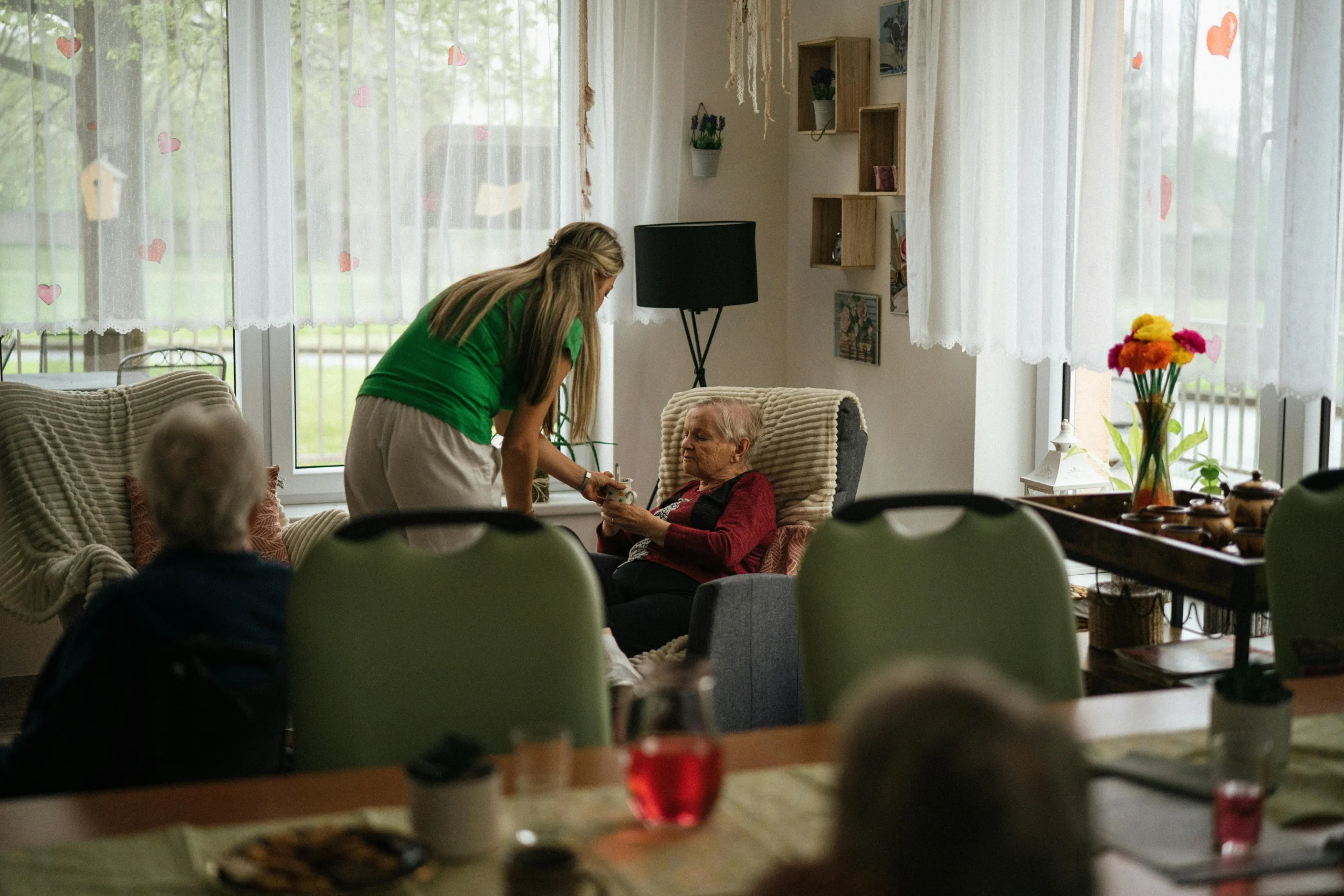 woman caring for elderly mother